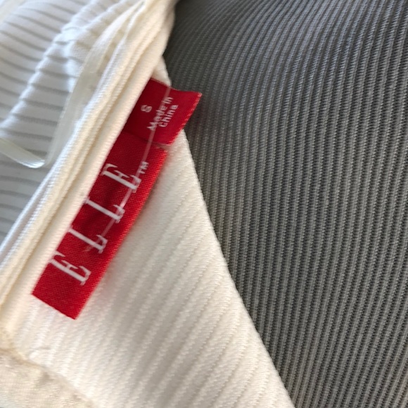 Striking Architectural Peplum Top - Picture 10 of 10